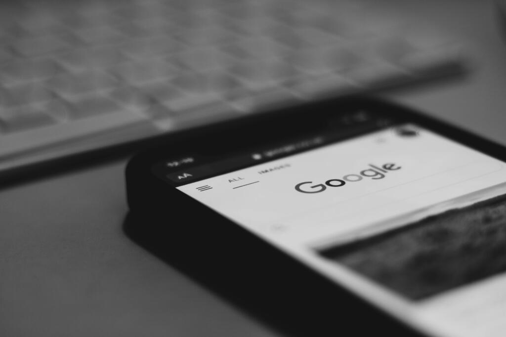 Mobile phone displaying Google search results of a high-intent customer