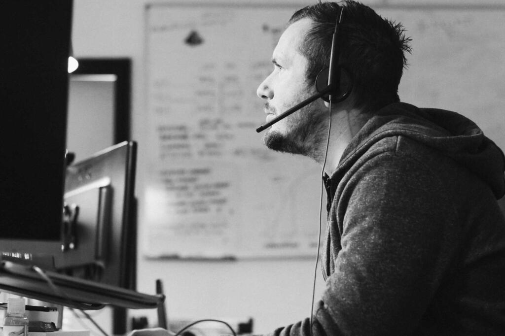 man working looking at screen